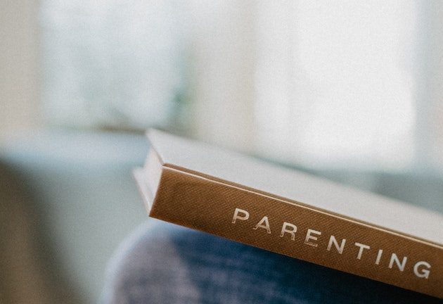 A brown book entitled Parenting rest on a blue surface. We know parenting kids gets hard sometimes. Sojourner Counseling child therapy in Raleigh NC can be just the thing a parent needs to help their child. Call today to get started with a child therapist near you!
