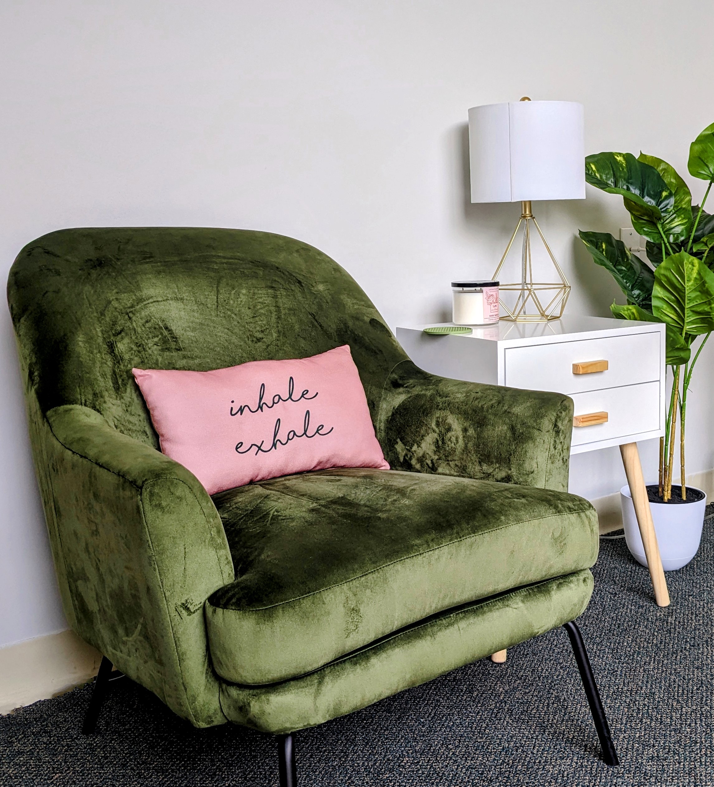 Office chair next to a side table and plant. Asking for help is hard. There's hope for you through Christian counseling in Raleigh, NC. Call Sojourner counseling today to begin working with a Christian counselor in Raleigh. 