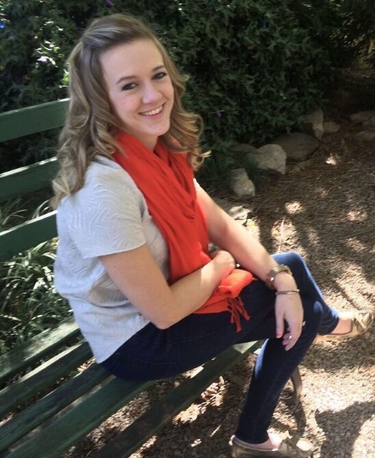 Betsy is sitting outside on a bench. Her legs are crossed and she smiles at the camera. Betsy is an intern who counsels teens and adults. Begin working with Betsy today for Christian counseling in Raleigh NC!